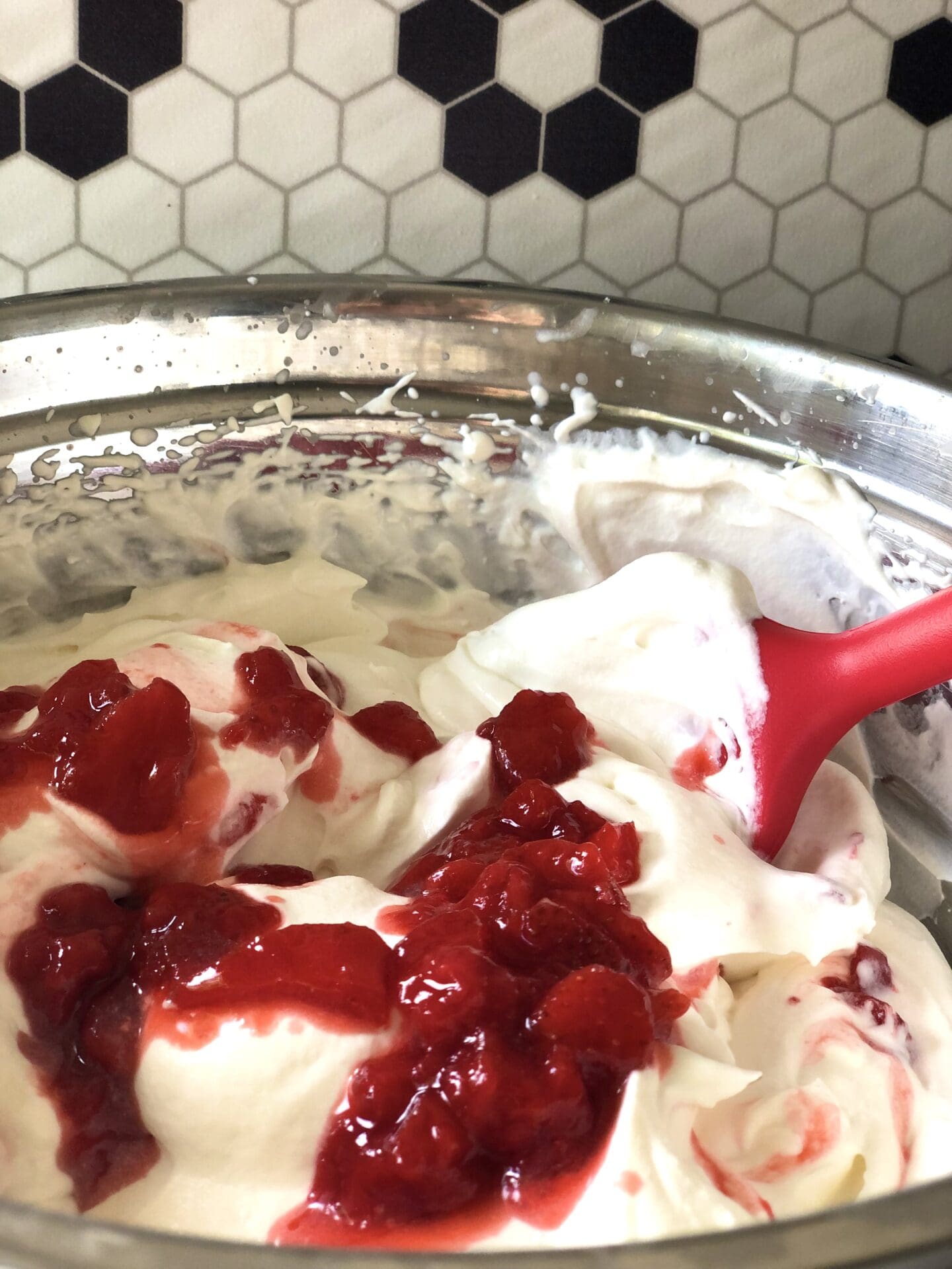 08AADE96-66D7-4BF4-BBFB-448FBB6F848B Strawberries and cream in a mixing bowl