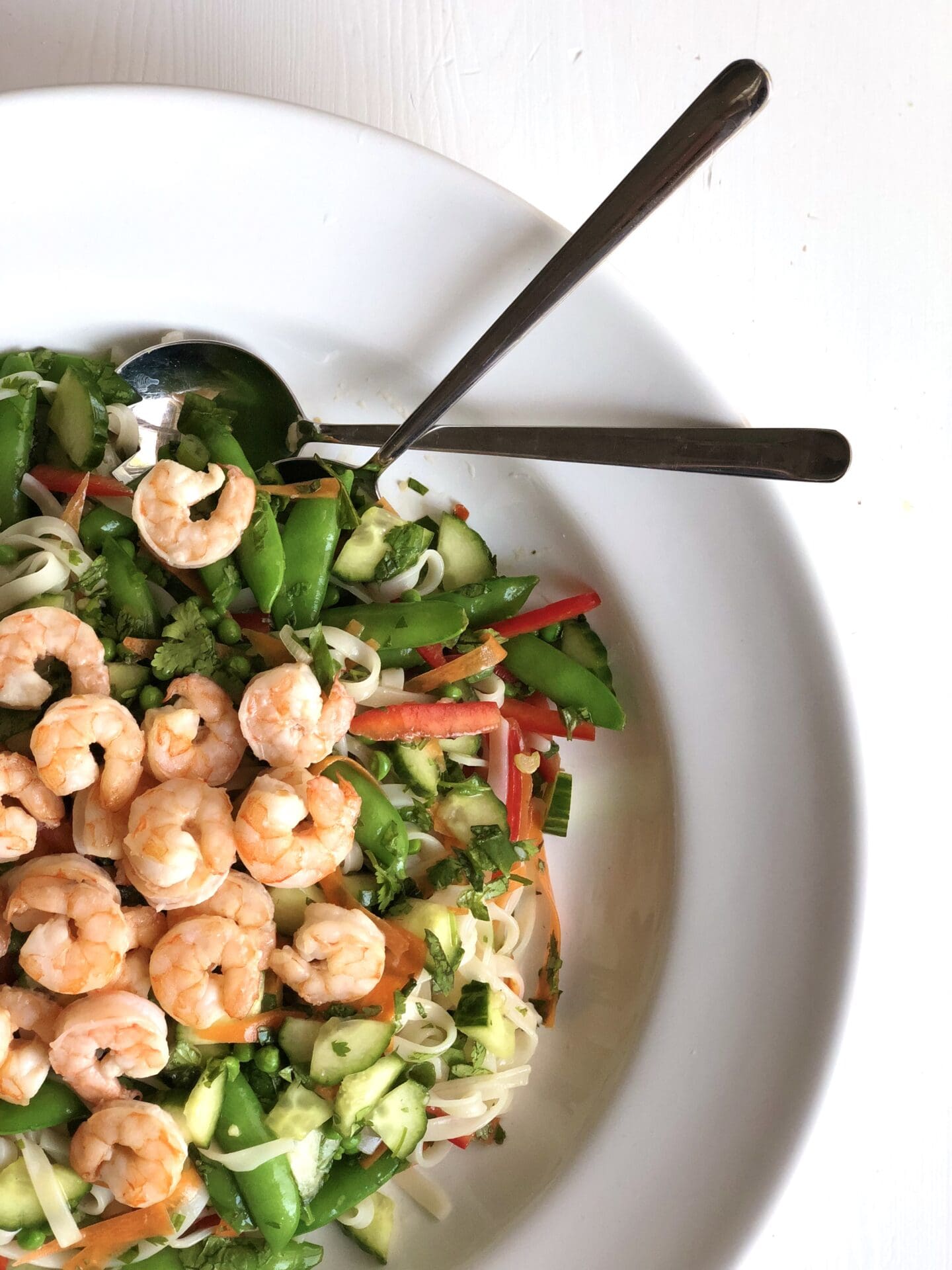 3A548B81-42C0-4898-9A89-A0C4BF45085D Thai noodle salad with vegetables, fresh herbs and roasted shrimp seen from above