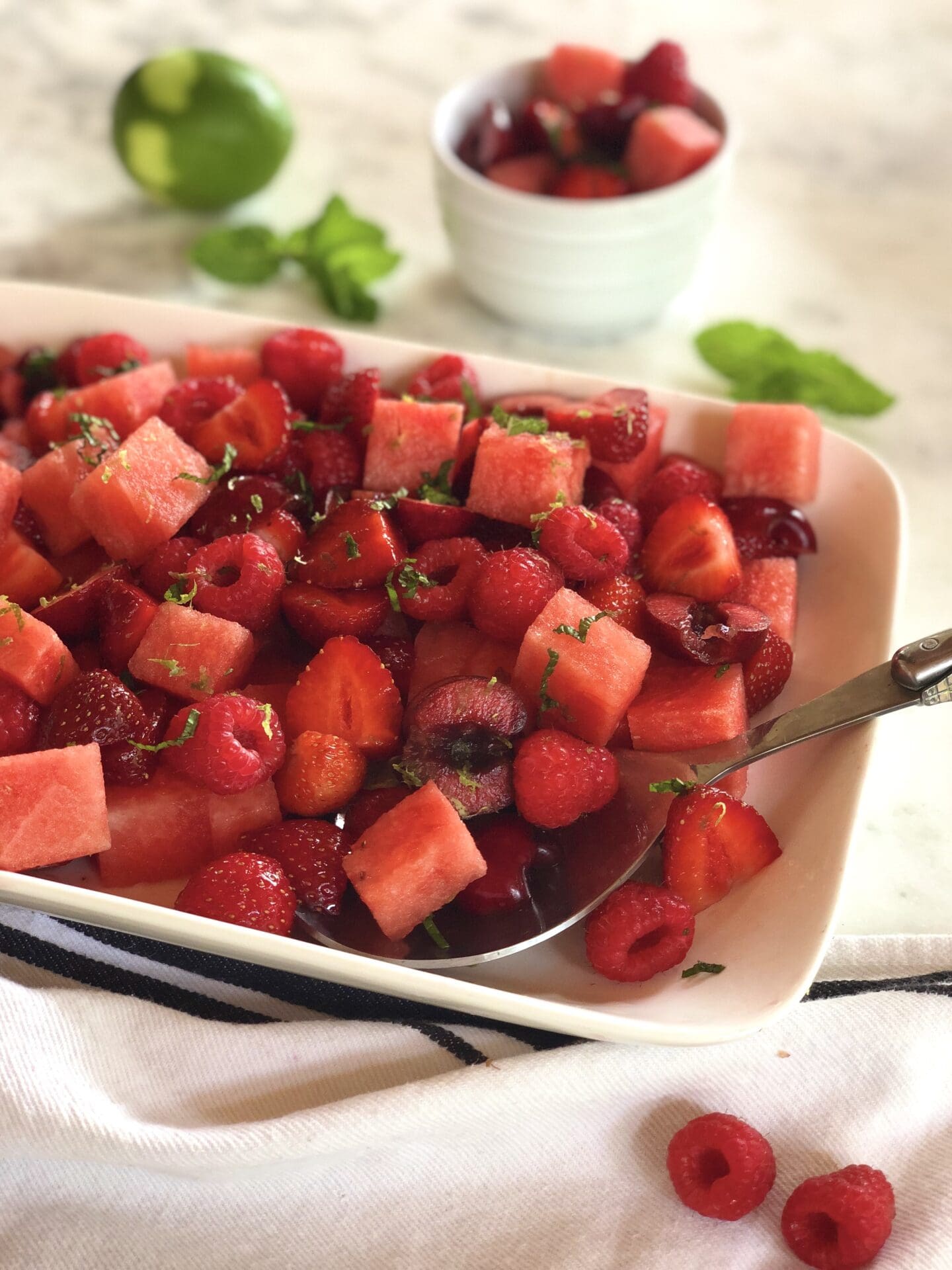 9D8C3ABF-0020-43B4-9609-AA352ABA5A7E Red fruit salad with berries cherries and watermelon
