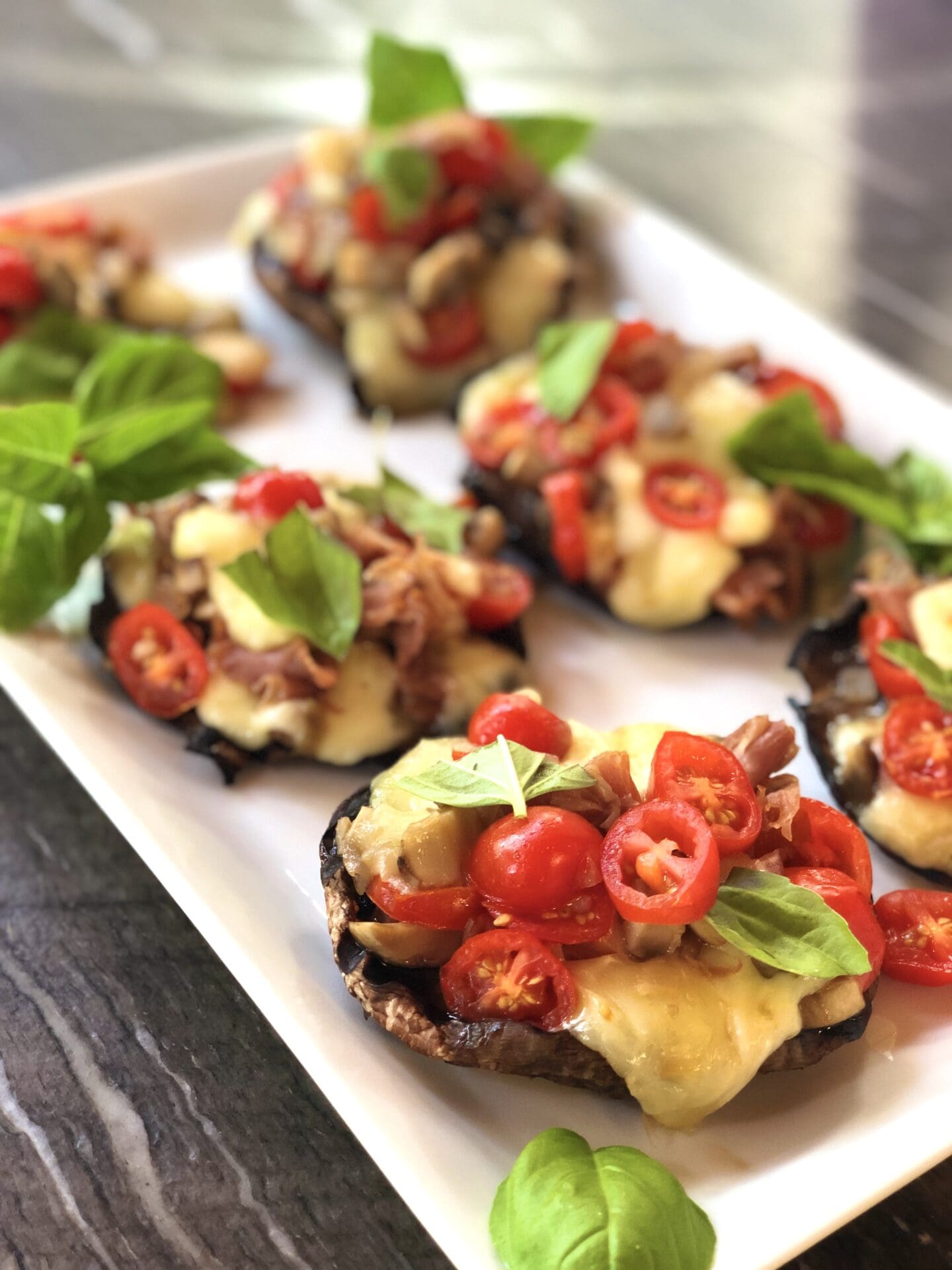 A9EF3EB8-4E47-4789-B6C8-256106B93B4E platter of italian stuffed portobello mushrooms