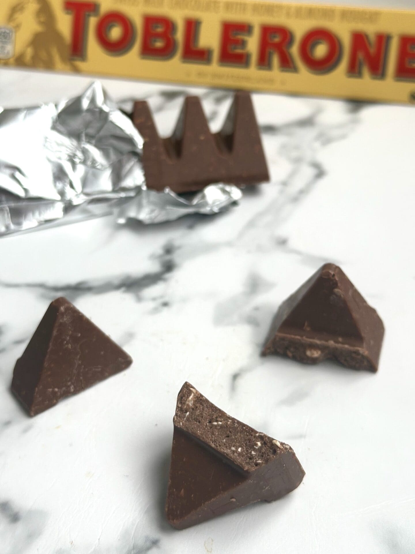 IMG_0702 Toblerone chocolate is seen in the package, as a whole bar and broken into pieces