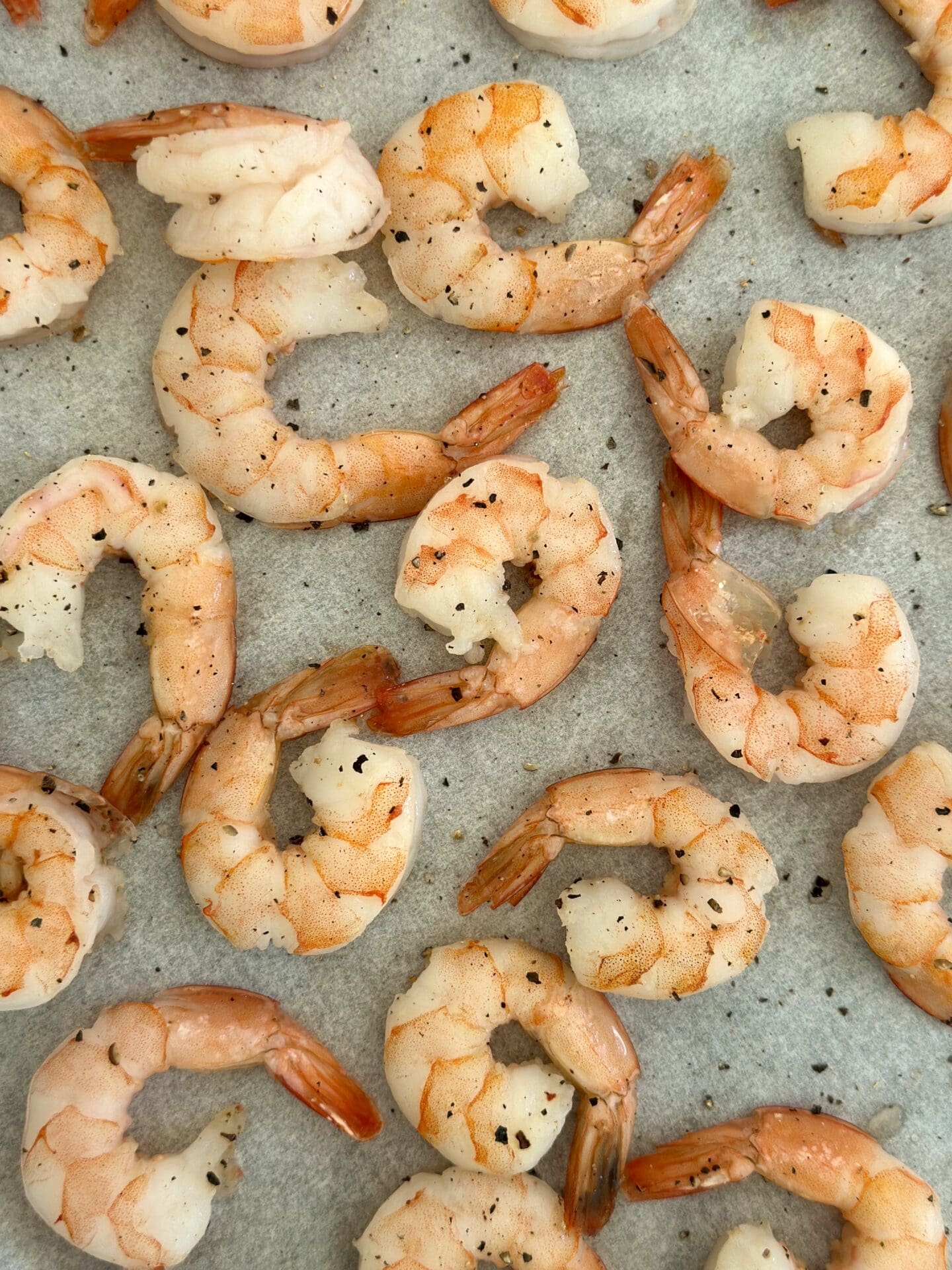 IMG_1422 Roasted shrimp are seen from above on a baking sheet