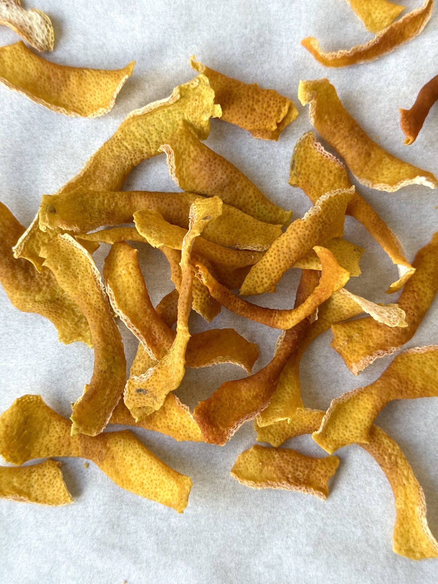 IMG_4110 A pile of dehydrated strips of lemon zest are seen from above