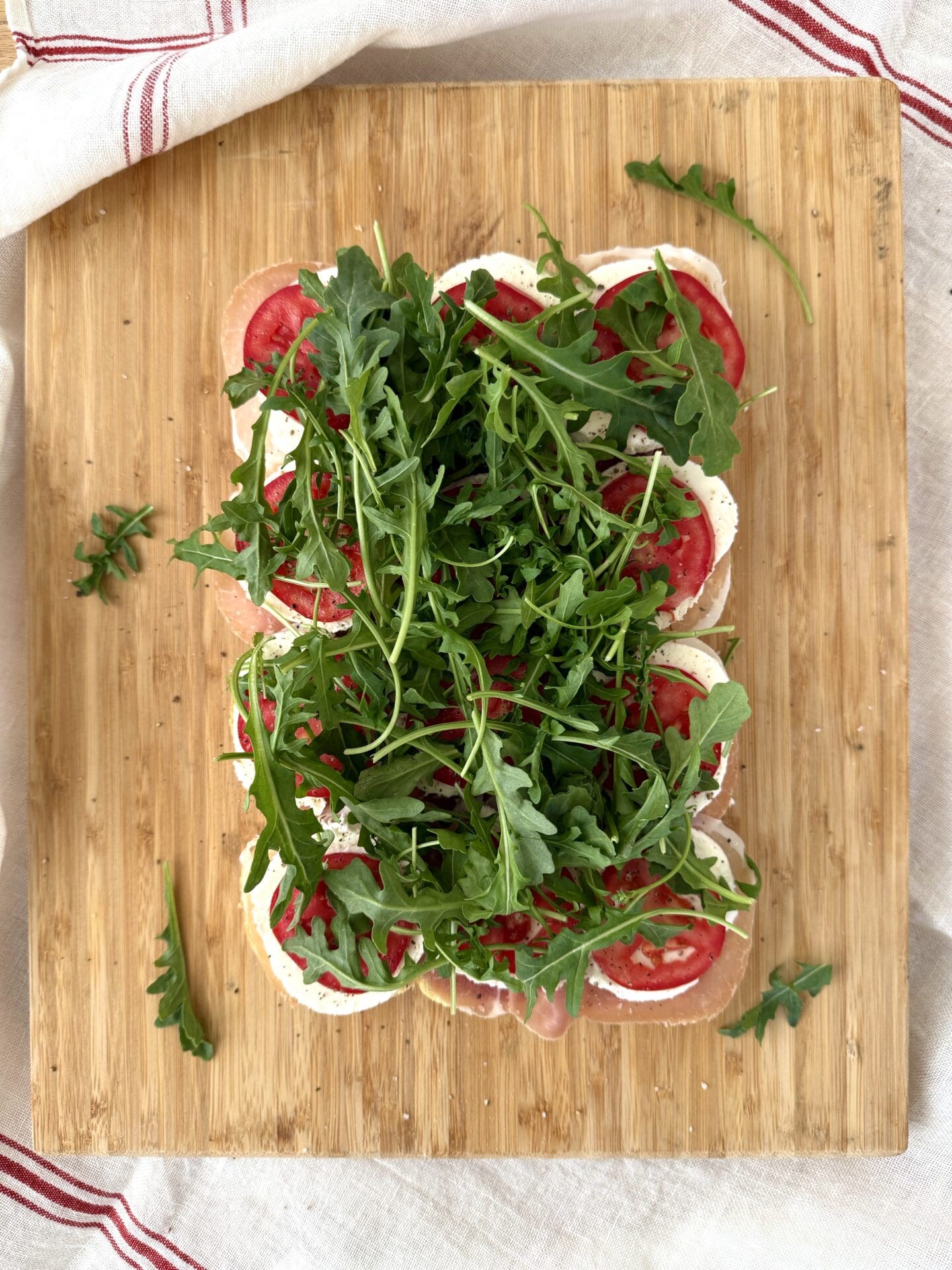 IMG_5011 Fresh baby arugula is heaped on Italian Antipasto Sliders.